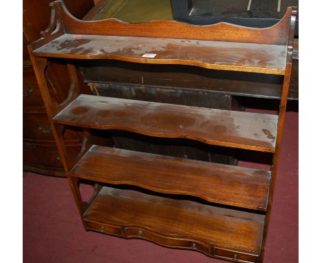 A mahogany four tier wall shelf, on pierced end supports, with three short drawers below, w.69cm 