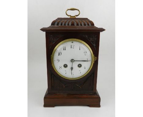 A early 20th century mantel clock, having eight day cylinder movement. H.28cm