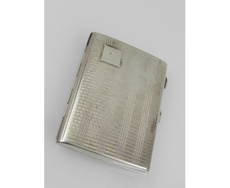 A silver cigarette case, with engine turned decoration, hallmarked Birmingham 1926. L.8cm