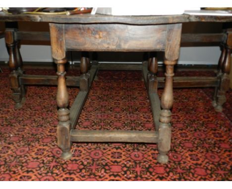 An early 20th century oak gate leg drop leaf table. L.170cm W.185cm (extended)