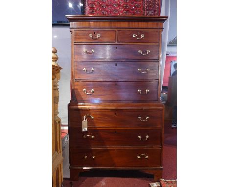 A 19th Century mahogany chest on chest with an arrangement of nine drawers, raised on bracket feet. H-186cm, W-106cm, D-52cm 