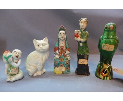 Five early 20th Century Chinese ceramic figures to include Guan Yin, a parrot, a lady, a child and a cat. 