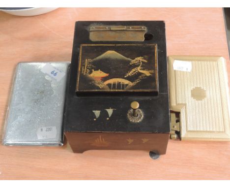 A lacquered cigarette dispenser, an engine tooled lighter cigarette case and engine tooled cigarette case  