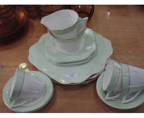 A Deco style Colclough part tea service and Myotts cake stand 