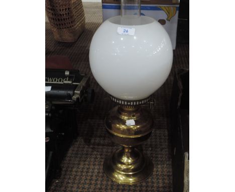 Brass oil lamp with milk glass shade and chimney. 