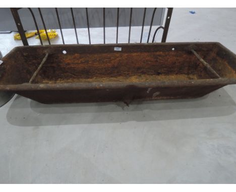A cast iron trough