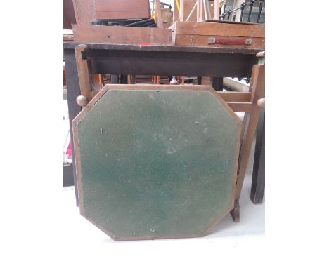 A folding reversable card table 