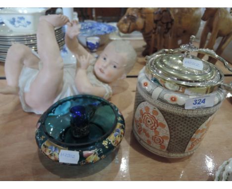 A ceramic doll figure, a ceramic biscuit barrel and piece of art glass
