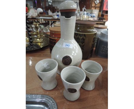 A Kentmere studio pottery decanter and goblets
