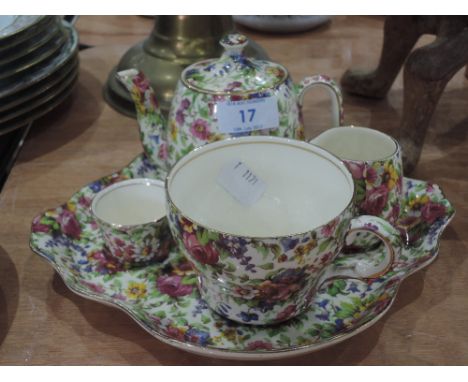 A set of Royal Winton Summertime chintz tea for one, with teapot, milk A/F, sucre and cup on tray 