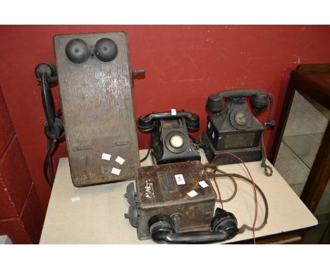 Vintage telephones - an Ericsson Magneto Wall phone; another wall phone; an ATM Bakelite phone; another Bakelite. (4)