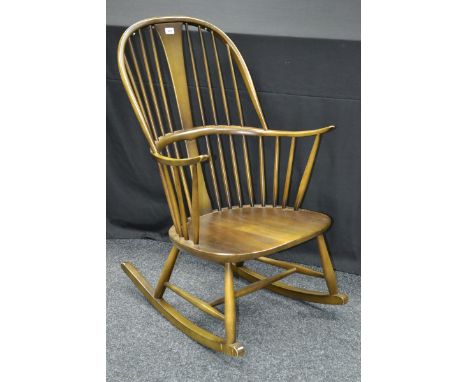An Ercol rocking chair, spindle back