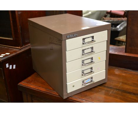 A Bisley four drawer desk top filing cabinet