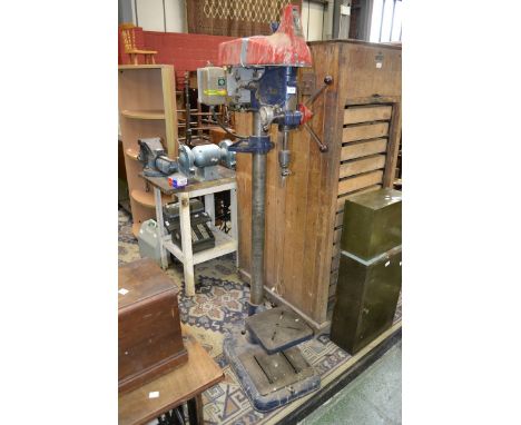 A Buck and Hickman floor standing pillar drill; a large Record steel vice on bespoke stand; a Kamasa tools heavy duty grindin