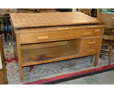 A mid 20th century beechwood studio desk, c.1960