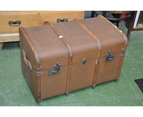 An early 20th century travel trunk, original lining