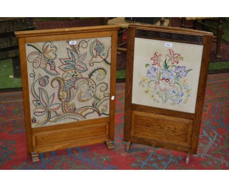 An early 20th century oak fire screen; another (2)