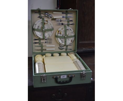 A Brexton 1950's/60's picnic hamper, the saucers and tea plates printed with Venetian views and gondoliers, complete