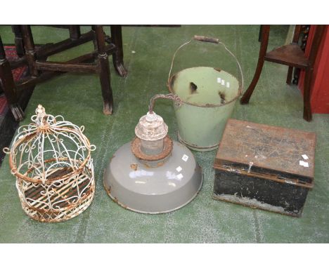 A late Victorian metal deed box, c.1890 - 1900; a fire bucket; a metal bird cage; a metal factory lamp shade (4)