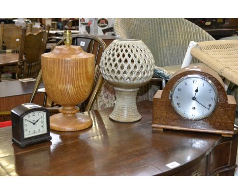 A Lloyd lamps studio pottery table lamp;  another 1960s plywood;  a Smiths Bakelite clock;  another oak cased (4)