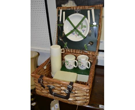 An Antler wicker picnic hamper, fitted