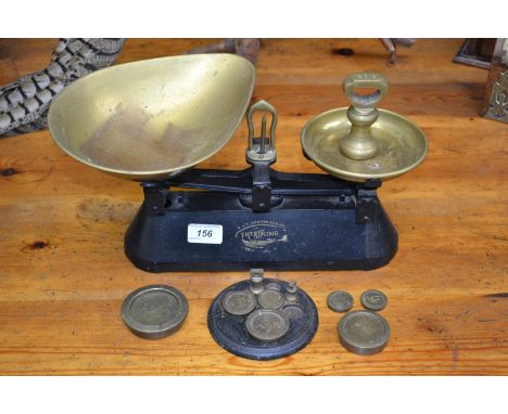 A set of Viking cast iron and brass kitchen scales and weights