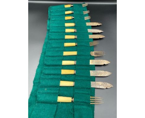 A silver and bone set of six fish knives and forks, hallmarked for Sheffield 1873 by Harrison Brothers &amp; Howson