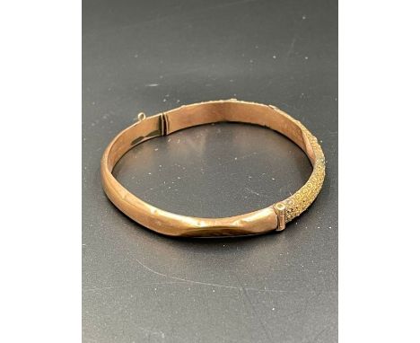 A 9ct gold bangle AF (Total weight 6.4g)