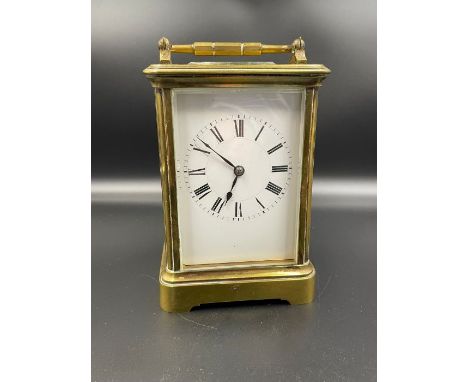 A French Brass carriage clock, with original key 