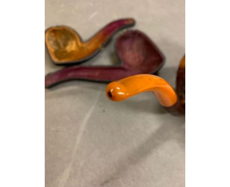 A cased carved pipe in the form of a solider 