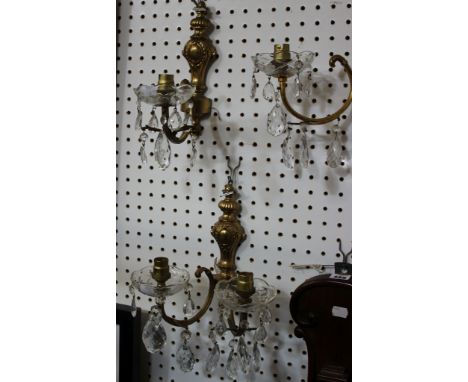 Three gilt finished wall lights , a pink china chandelier, a brass finished ceiling light and a mirror.(Sold as parts)