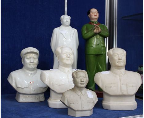 A Chinese Cultural Revolution statuette of Chairman Mao in green army uniform, and further busts and statuette of Chairman Ma