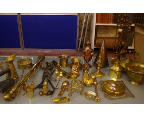 A quantity of metalware; fire tools, hunting horn etc 