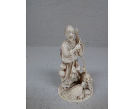 Chinese carved ivory figure of a gentleman playing musical instrument with charter mark to base, 10cm H