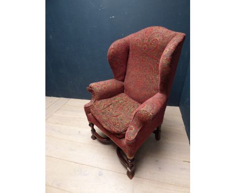 Large gentleman's chair with cross-section feet and tapestry style upholstery