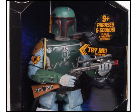 A Star Wars ' Talking Boba Fett ' large scale action figure. By Disney Store exclusive. Working order with lights and sounds.