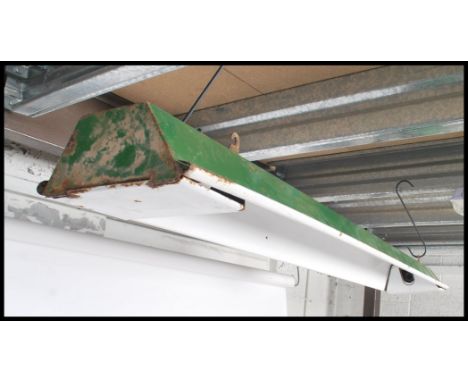A good early 20th century Revo, circa  1940's Industrial enamel pendant long strip light in two tone green and white colourwa