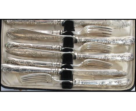 A 19th century Victorian silver hallmarked six person knife and fork set consisting of six silver hallmarked handled knives a