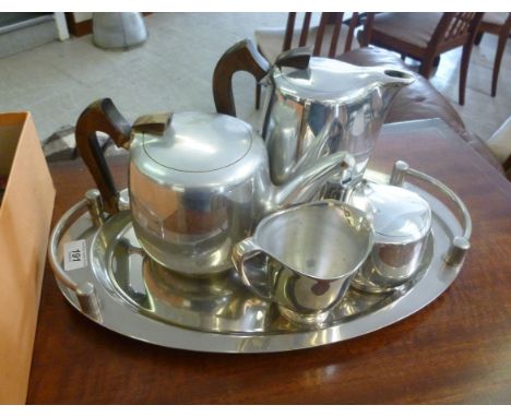 A four piece Piquot Ware tea set  comprising teapot, coffee pot, sugar basin and cream jug; and a similar tray  18''w       R