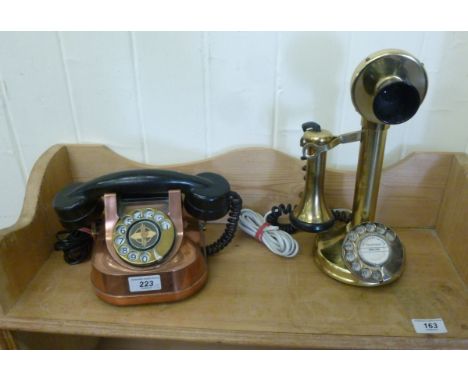 Two modern vintage design telephones: to include a brass stick example  12''h        RAB