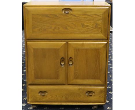 Ercol Windsor Golden Dawn bureau with fall front above two cupboard doors and single drawer, 83 x 45 x 110 cm H. Not availabl