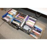 Four boxes containing various musical and other Au