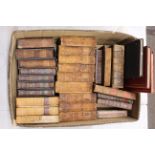 A collection of antiquarian leather bound books to