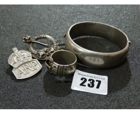 A Silver Bangle, A Silver Celtic Style Brooch Etc