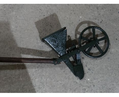 A Vintage Wooden Handled Seed Drill