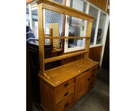 An Antique Stripped Pine Kitchen Dresser Having A Two Shelf Rack The Base With An Arrangement Of Drawers And Centre Cupboard