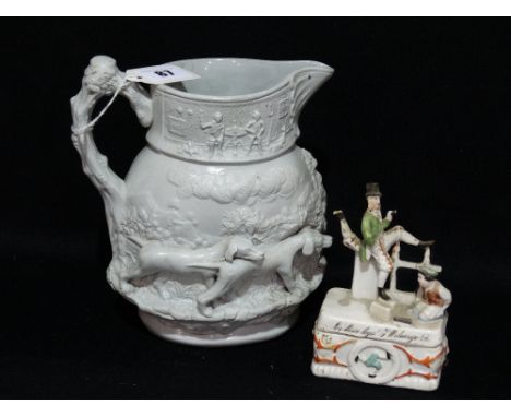 A Staffordshire Pottery Moulded Hunting Jug Together With An Isle Of Man China Pairing
