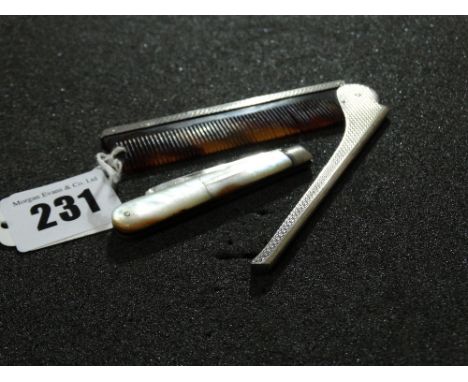 A Silver Framed Folding Comb Together With A Silver Bladed Fruit Knife