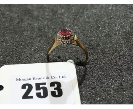 A 9 Carat Gold Diamond And Ruby Ring