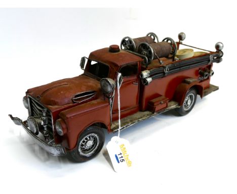 Reproduction tin plate model of a fire engine, measures 35cm long